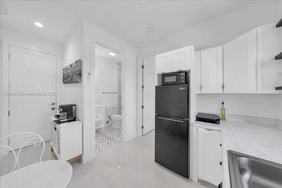 Furnished interior view inside a new home in , Lehigh Acres (Image 18). Furnished interior view inside a new home in , Lehigh Acres (Image 18).