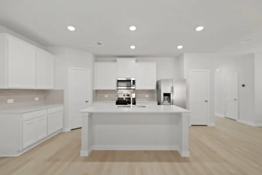 Furnished interior view inside a new home in Lakes at Black Oak, Magnolia (Image 9).