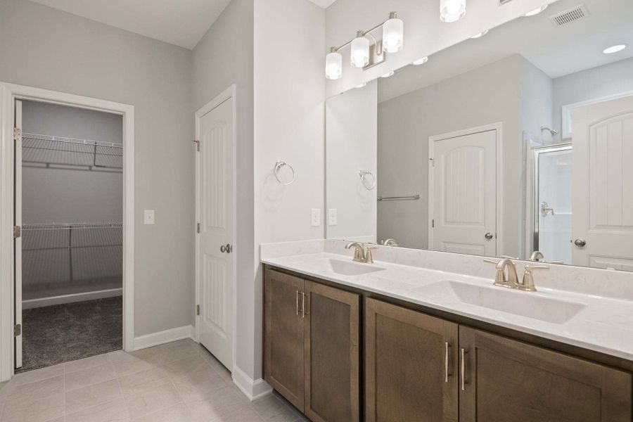 Representative furnished interior of a home built from the Garland by Caviness & Cates Communities in Bartlett Manor, Youngsville (Image 215). Representative furnished interior of a home built from the Garland by Caviness & Cates Communities in Bartlett Manor, Youngsville (Image 215).