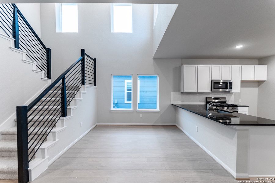 Furnished interior view inside a new home in Hennersby Hollow, San Antonio (Image 8).