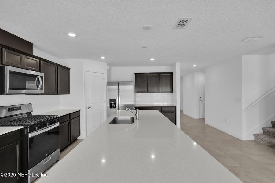Furnished interior view inside a new home in Wells Landing, Jacksonville (Image 11). Furnished interior view inside a new home in Wells Landing, Jacksonville (Image 11).