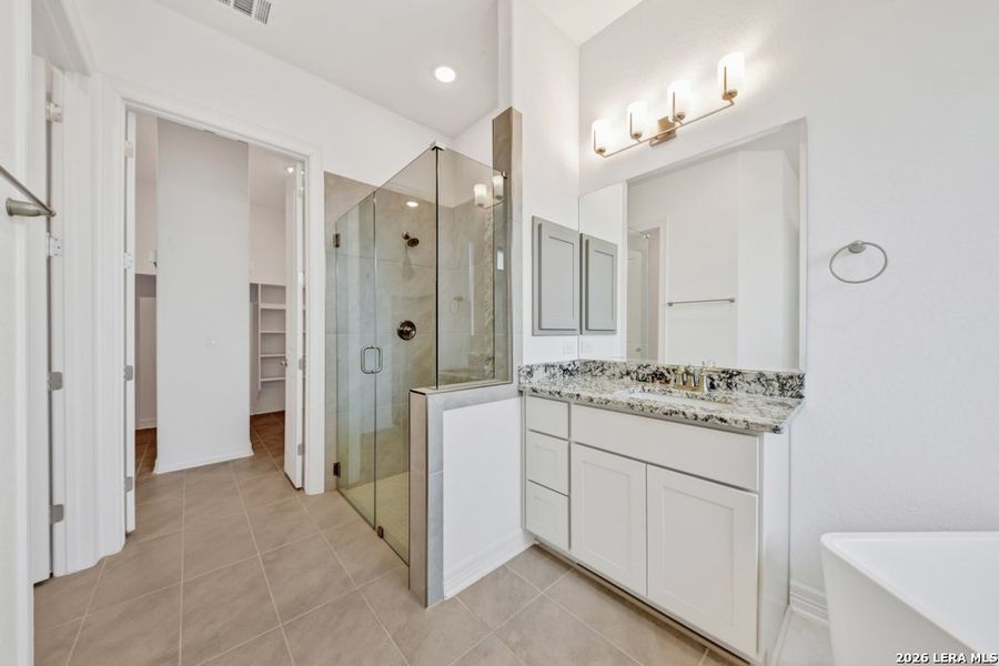 Furnished interior view inside a new home in El Sonido at Campanas, San Antonio (Image 13).