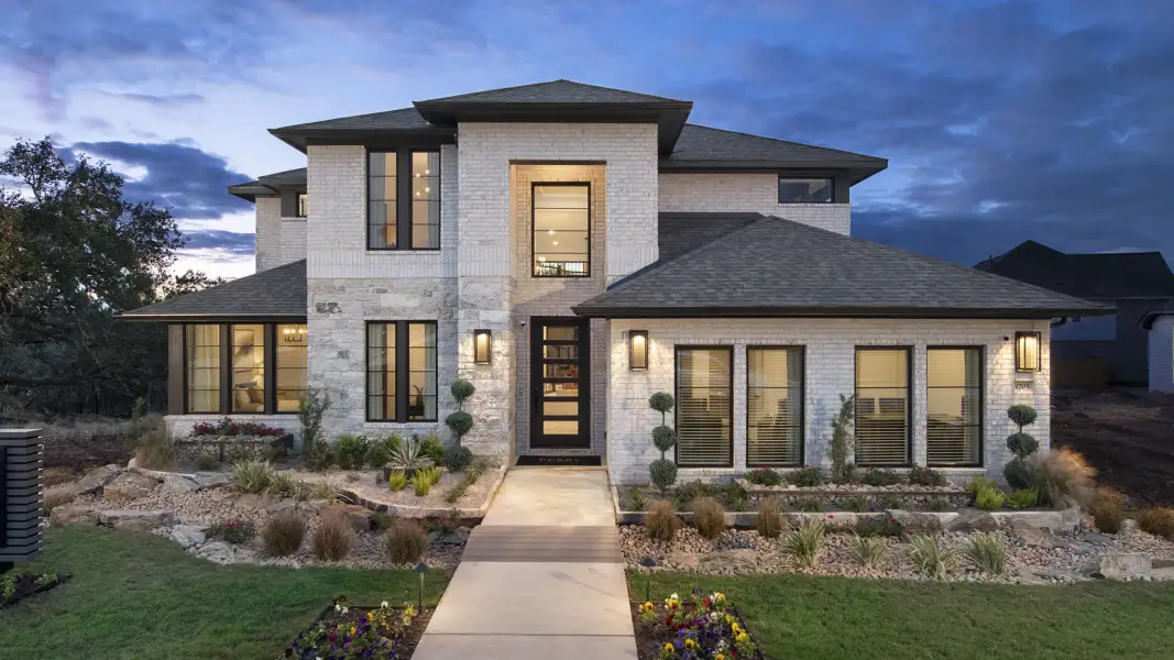 Representative exterior photo of a completed home built from the 3399W by Perry Homes in Briarley, Montgomery, TX (Image 29).