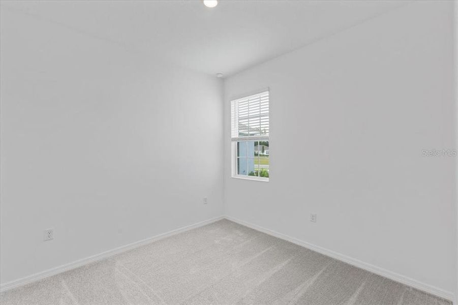 Spacious, unfurnished interior of a new home in Mirror Lake Village, Fruitland Park (Image 7).