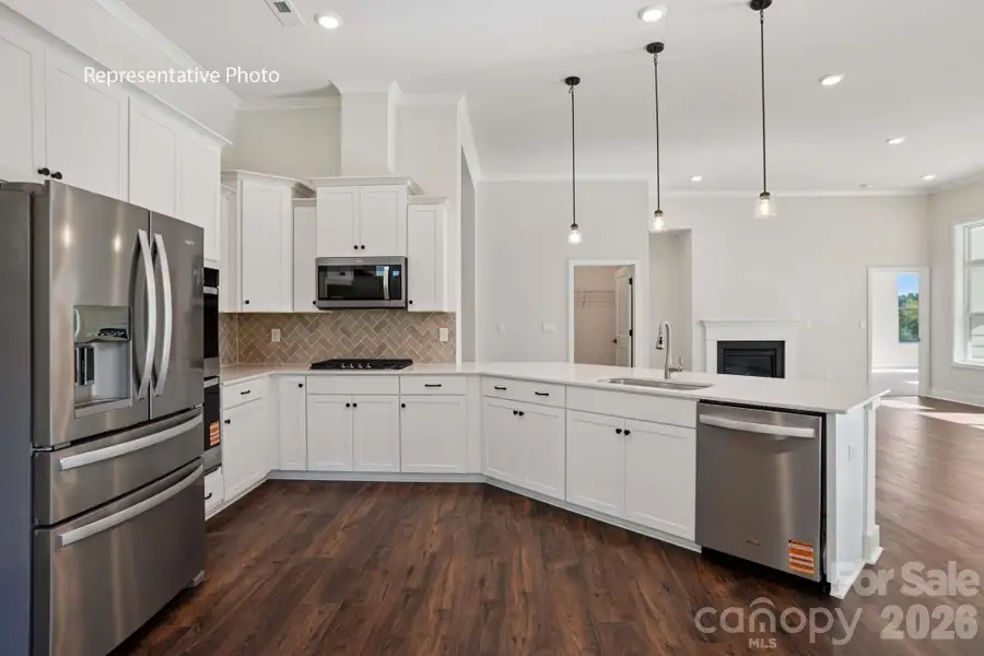Furnished interior view inside a new home in Sanctuary at Southgate, Indian Trail (Image 7).