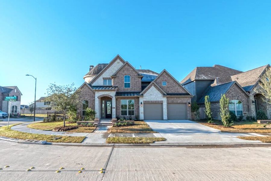 Representative exterior photo of a completed home built from the 3799 by Ravenna Homes in The Woodlands Hills 65′, Willis, TX (Image 27). Representative exterior photo of a completed home built from the 3799 by Ravenna Homes in The Woodlands Hills 65′, Willis, TX (Image 27).