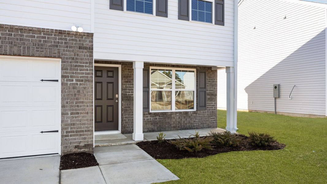 Exterior details and patio area of a home in Madeline Farm, New Bern (Image 4).