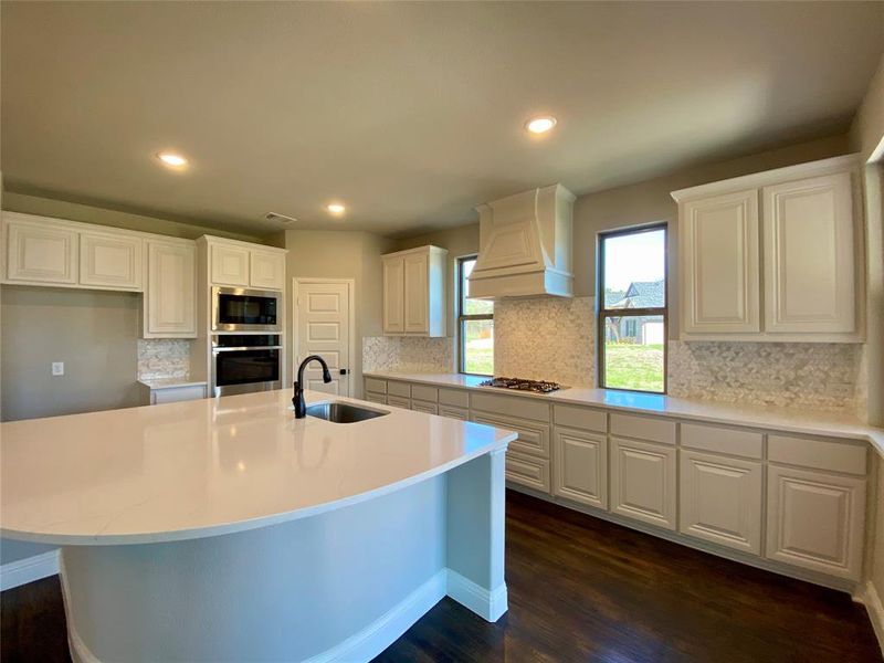 Kitchen offers White cabinets, Marcella white with grey veins quartz & decorative mosaic tile backsplash Kitchen offers White cabinets, Marcella white with grey veins quartz & decorative mosaic tile backsplash
