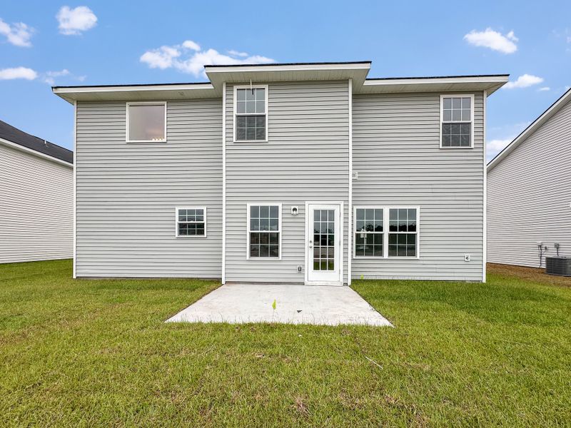 Exterior details and patio area of a home in Grand Reserve, Hinesville (Image 2).