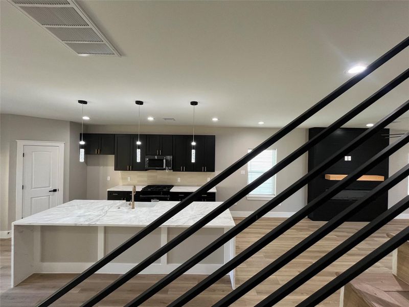 8006 Cora St custom wrought iron stair rails