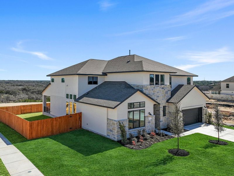 Exterior details and patio area of a home in Lariat, Liberty Hill (Image 3).