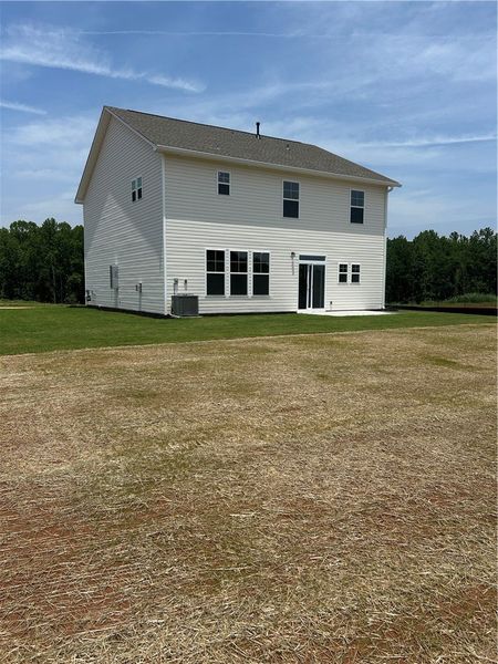 A well-maintained side exterior of a home offers a