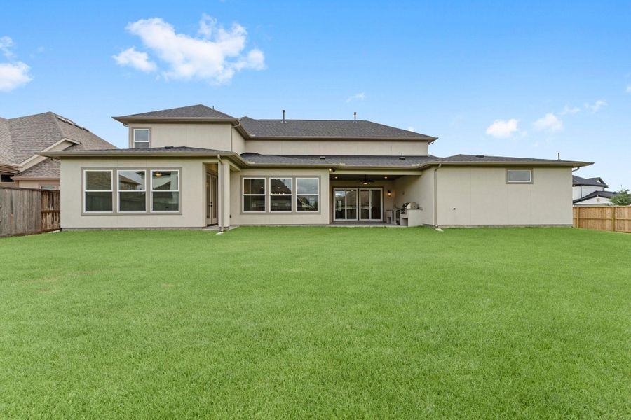 Exterior details and patio area of a home in , Spring (Image 3).