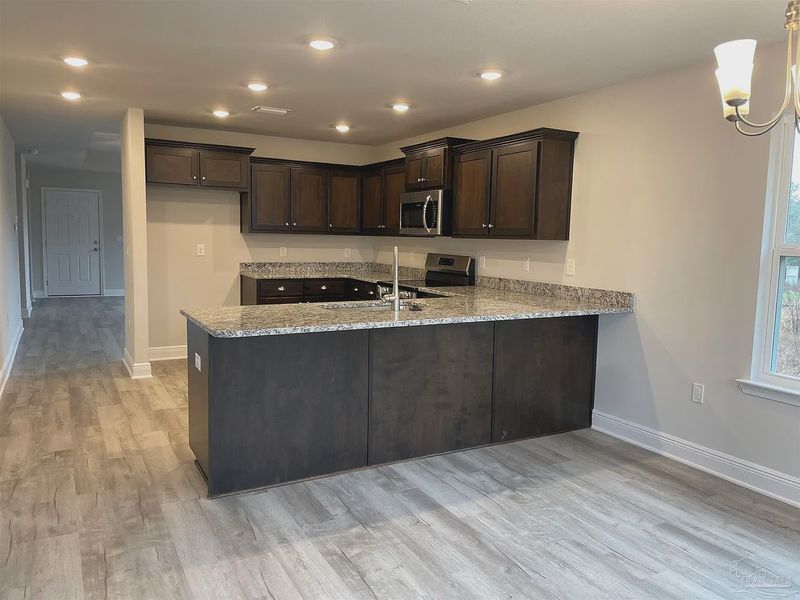 Furnished interior view inside a new home in Turtle Creek, Cantonment (Image 4).