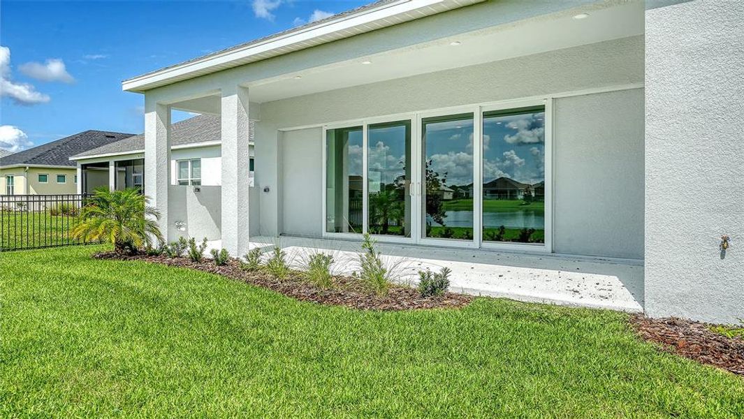 Exterior details and patio area of a home in Canoe Creek, Parrish (Image 3). Exterior details and patio area of a home in Canoe Creek, Parrish (Image 3).