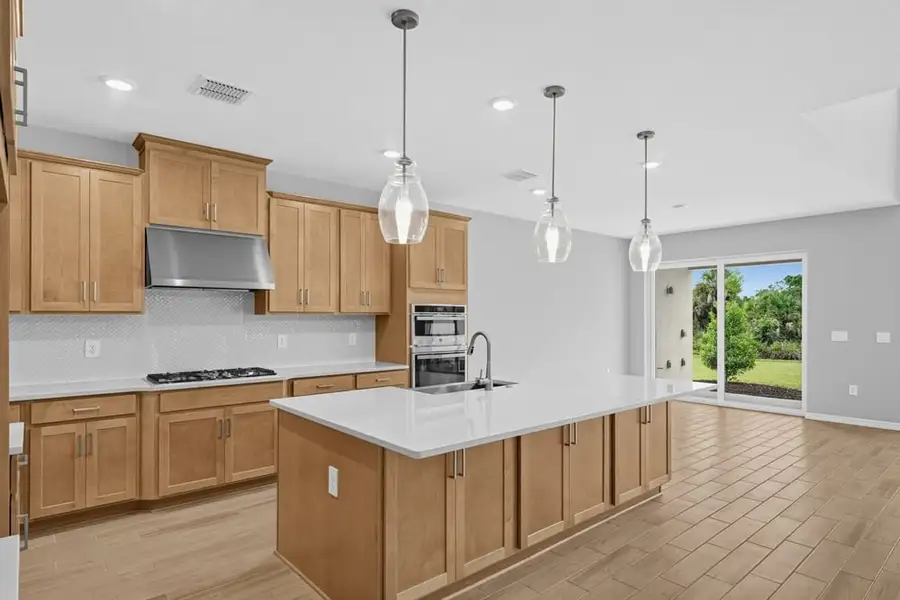 Representative furnished interior of a home built from the Tybee by Taylor Morrison in Lochside, Mount Dora (Image 7).