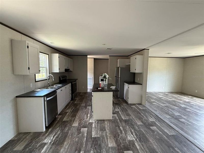 Furnished interior view inside a new home in , Okeechobee (Image 7).
