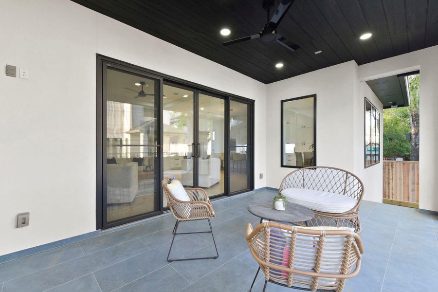 Back patio, with outdoor kitchen hookups. Large California doors. Back patio, with outdoor kitchen hookups. Large California doors.