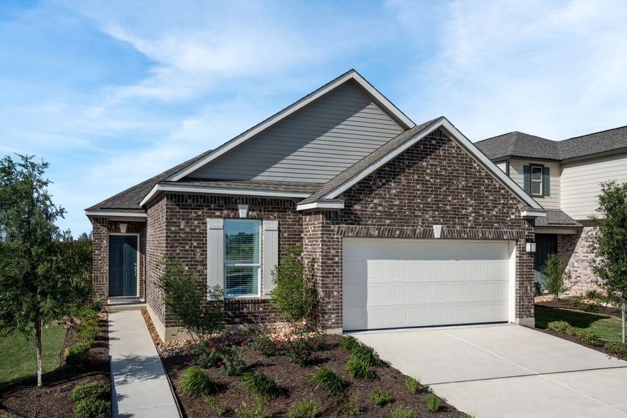 Representative exterior photo of a completed home built from the Plan 1702 Modeled by KB Home in Stoney Chase, Del Valle, TX (Image 14). Representative exterior photo of a completed home built from the Plan 1702 Modeled by KB Home in Stoney Chase, Del Valle, TX (Image 14).