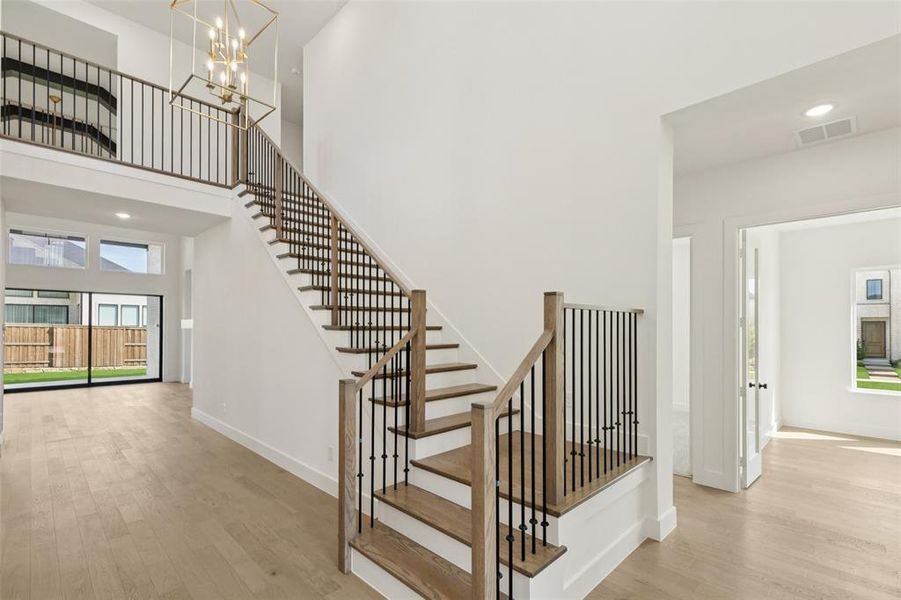 Step into our beautiful Brenham III dream home and be greeted by a gorgeous stair case featuring open railings and sight lines through to the rear of the home.