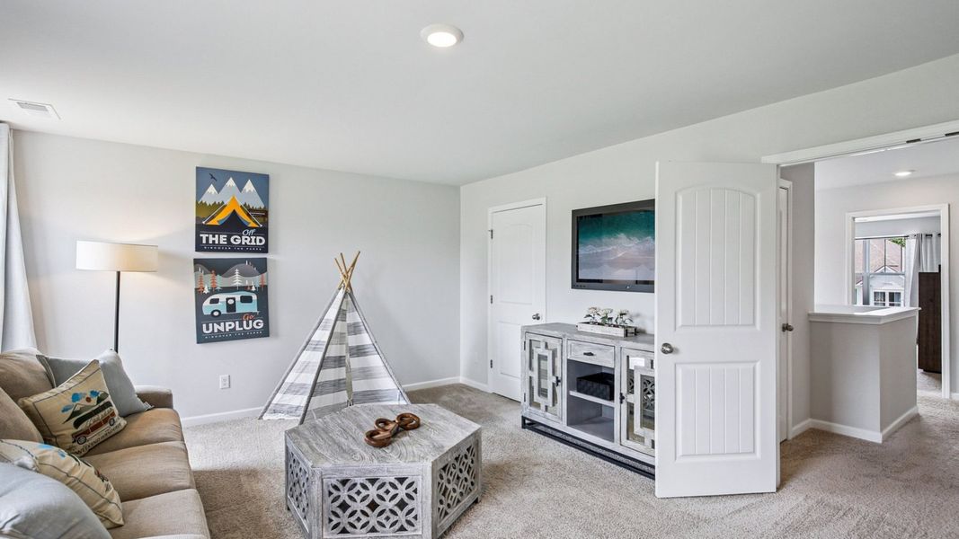 Furnished interior view inside a new home in The Parks, White House (Image 12).