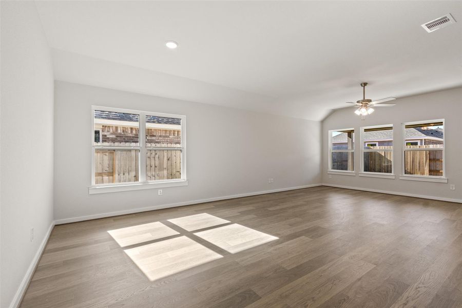 Spacious, unfurnished interior of a new home in Sunterra, Katy (Image 24).