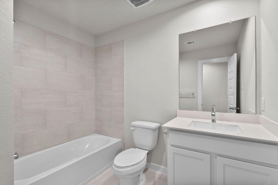 Furnished interior view inside a new home in Cypresswood Landing, Humble (Image 8).