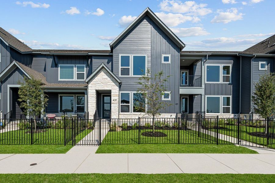 Front exterior of a new home in Emory Crossing, Hutto, TX, highlighting curb appeal (Image 25).