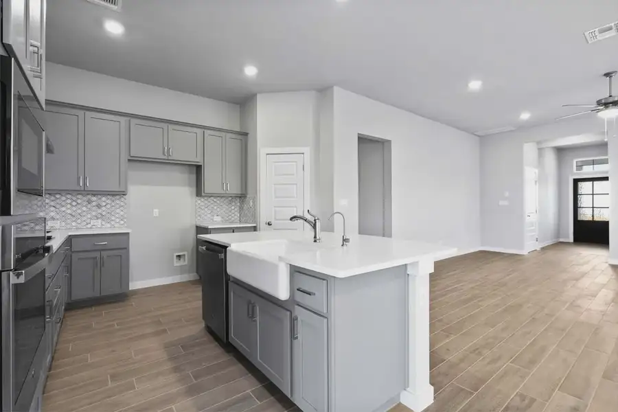 Representative furnished interior of a home built from the Cooper by Chesmar Homes in Nolina, Georgetown (Image 3).