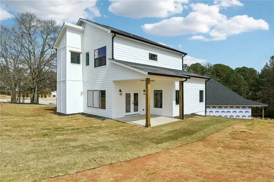 Exterior details and patio area of a home in , Loganville (Image 29).
