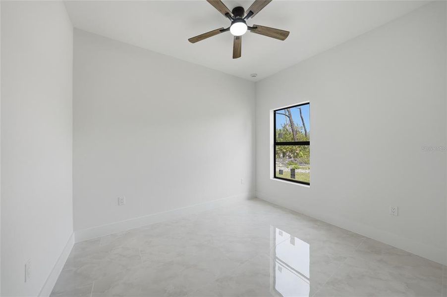 Spacious, unfurnished interior of a new home in , Port Charlotte (Image 37).