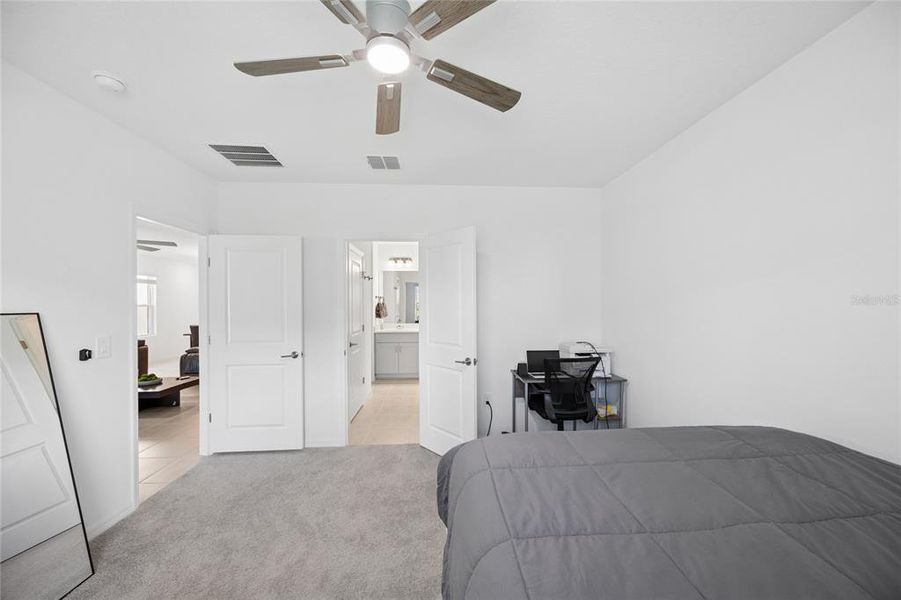 Furnished interior view inside a new home in Westview Community Group Page, Kissimmee (Image 8).