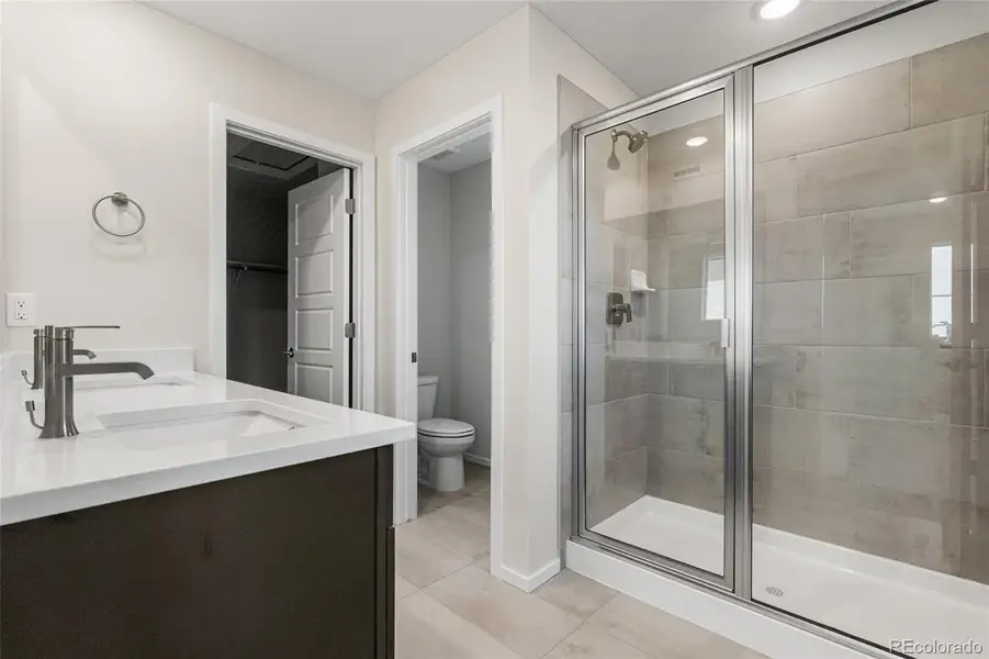 Furnished interior view inside a new home in Barefoot Village, Firestone (Image 7).