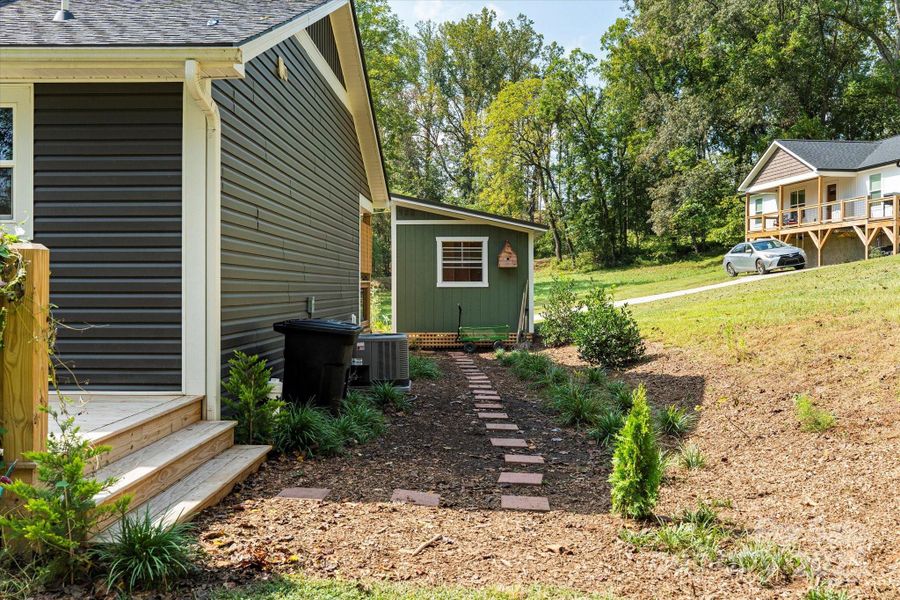 Exterior details and patio area of a home in , Alexander (Image 1).