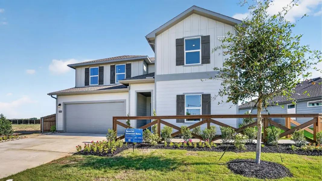 Representative exterior photo of a completed home built from the Ozark by D.R. Horton in Rock Creek West, Fort Worth, TX (Image 2).