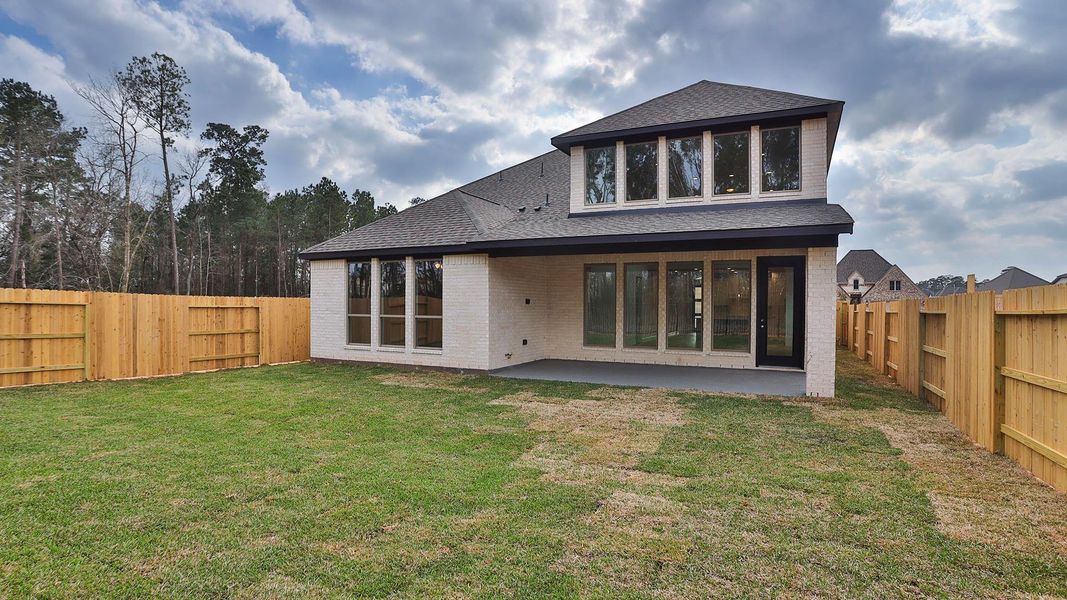 Exterior details and patio area of a home in Grand Central Park, Conroe (Image 2). Exterior details and patio area of a home in Grand Central Park, Conroe (Image 2).