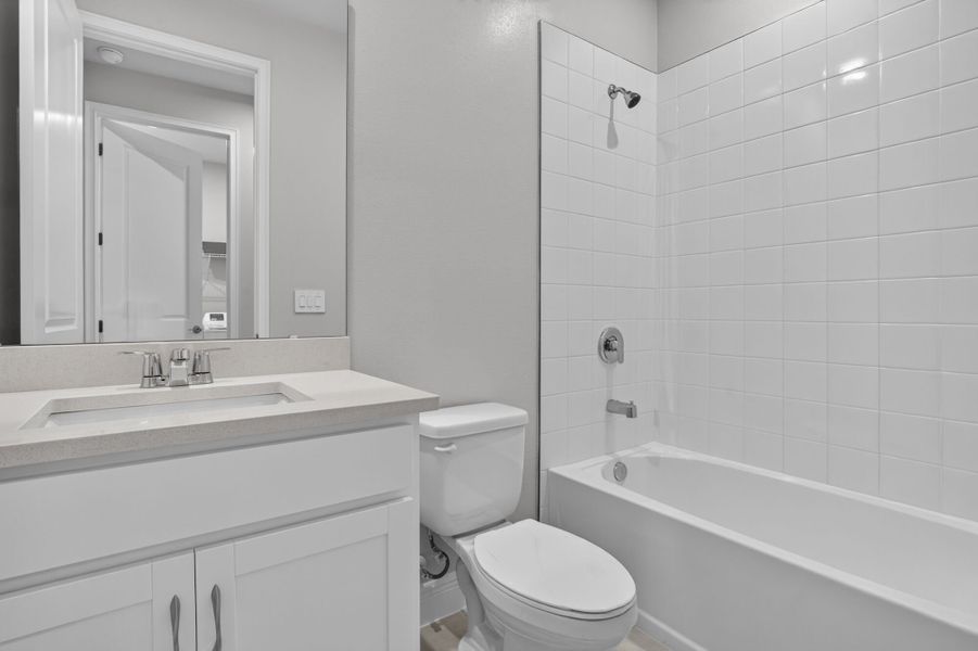 Furnished interior view inside a new home in Windwater, Parrish (Image 7).
