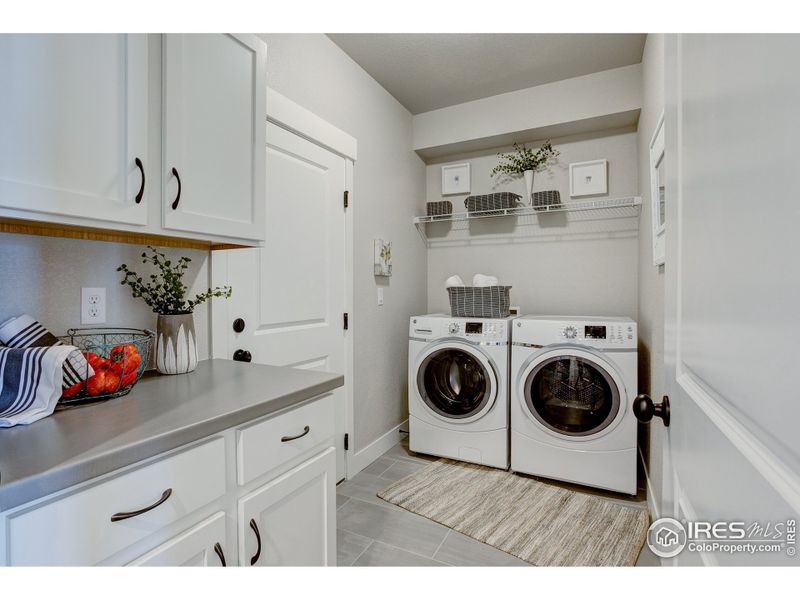 Laundry Room. Photos of a previously built model.