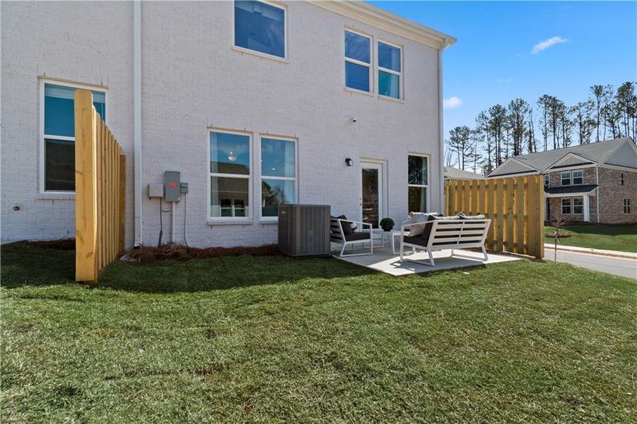 Exterior details and patio area of a home in Bowers Farm, McDonough (Image 4).