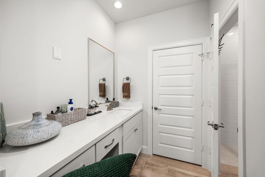 Furnished interior view inside a new home in The Corner At Buffalo Pointe, Houston (Image 13).