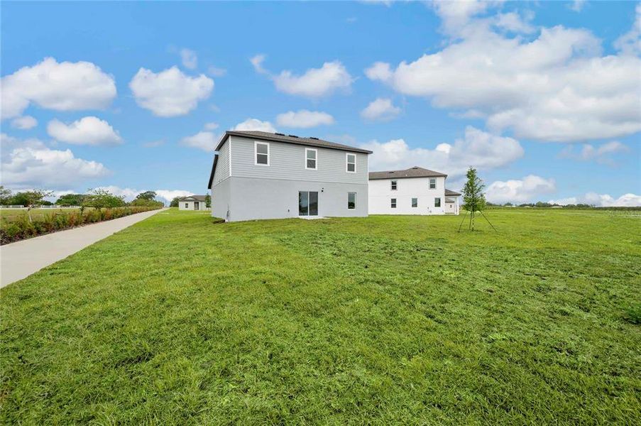 Exterior details and patio area of a home in Citrus Place, Babson Park (Image 3).