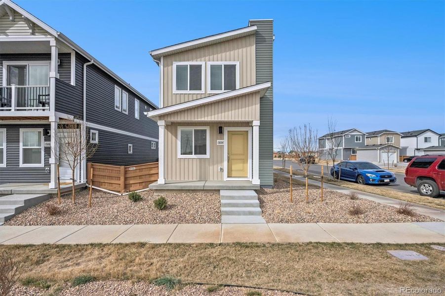 Exterior details and patio area of a home in Reunion, Commerce City (Image 21).