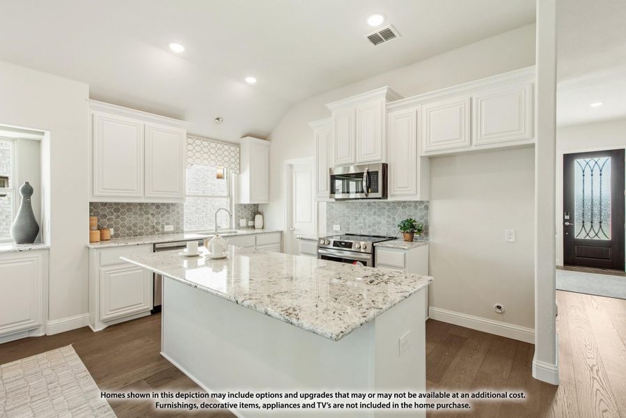 Kitchen with white cabinets, granite island, stainless steel appliances, hexagon tile backsplash, and hardwood floors Kitchen with white cabinets, granite island, stainless steel appliances, hexagon tile backsplash, and hardwood floors
