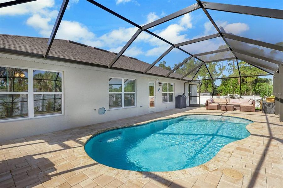 Exterior details and patio area of a home in , North Port (Image 22).