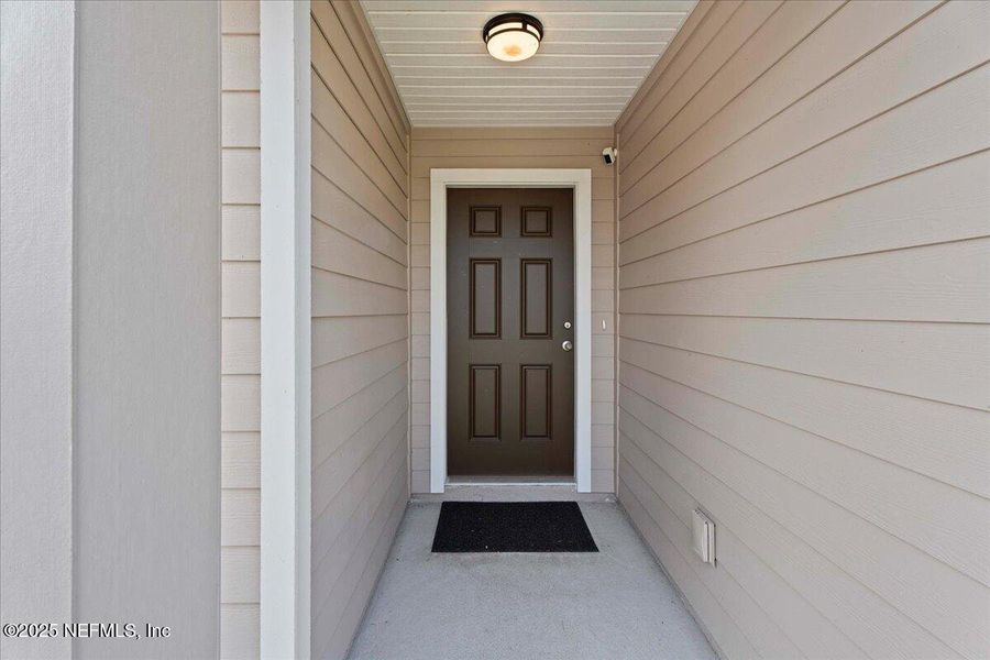 Exterior details and patio area of a home in Dunns Crossing, Jacksonville (Image 3). Exterior details and patio area of a home in Dunns Crossing, Jacksonville (Image 3).