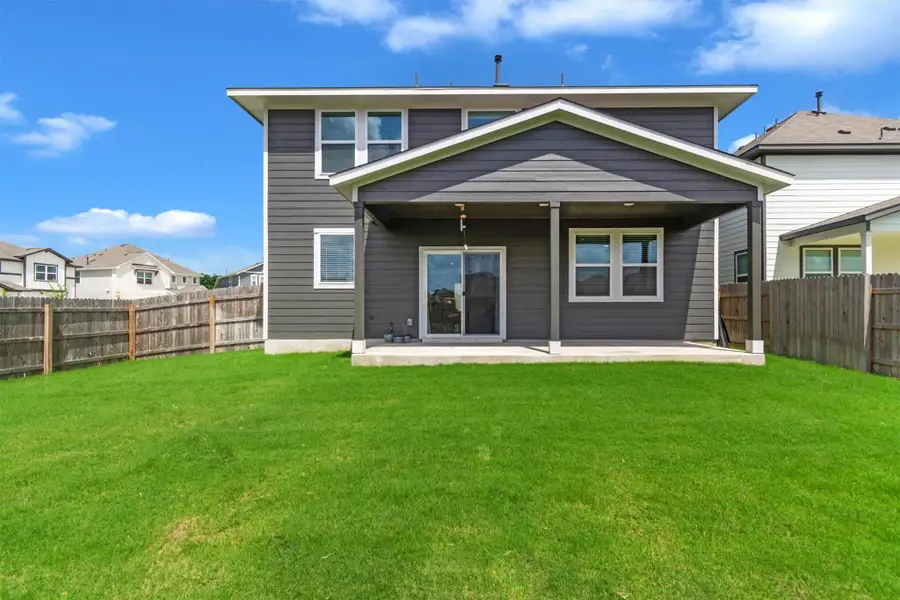 Wonderful covered patio and Large corner lot offers plenty of space for outdoor play Wonderful covered patio and Large corner lot offers plenty of space for outdoor play
