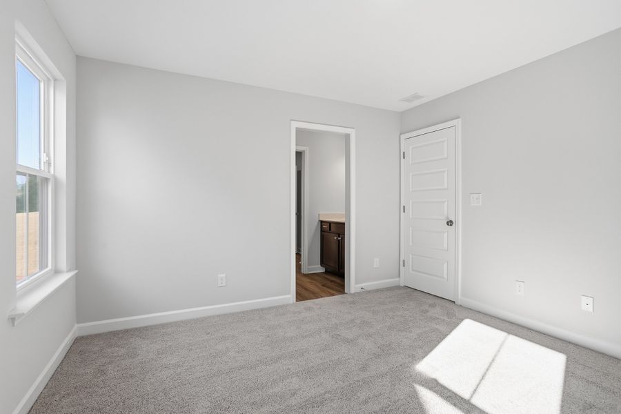 Spacious, unfurnished interior of a new home in Renaissance at White Oak, Garner (Image 31).