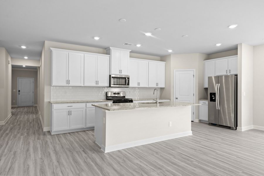 Furnished interior view inside a new home in Cypress Ridge - The Coastline Series, Longs (Image 5).