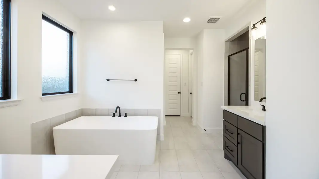 Furnished interior view inside a new home in Wolf Ranch 56', Georgetown (Image 4).