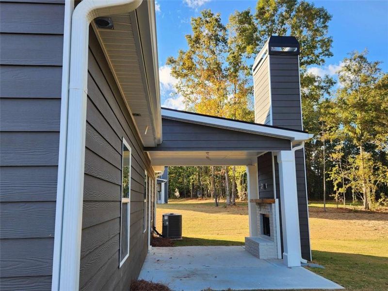 Exterior details and patio area of a home in The Woodlands Preserve, Jackson (Image 21).